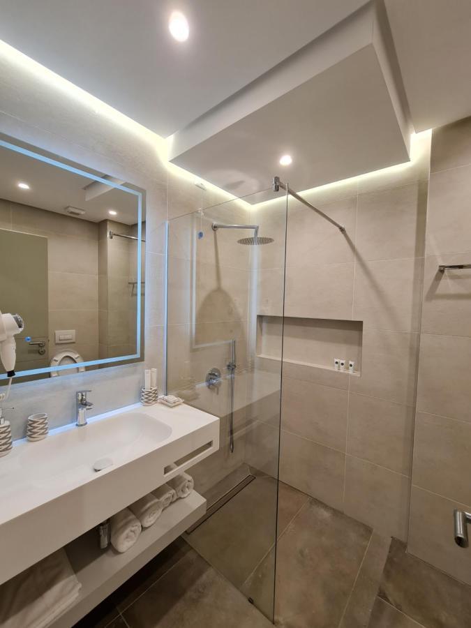 Hotel Aross Kanine Bagian luar foto