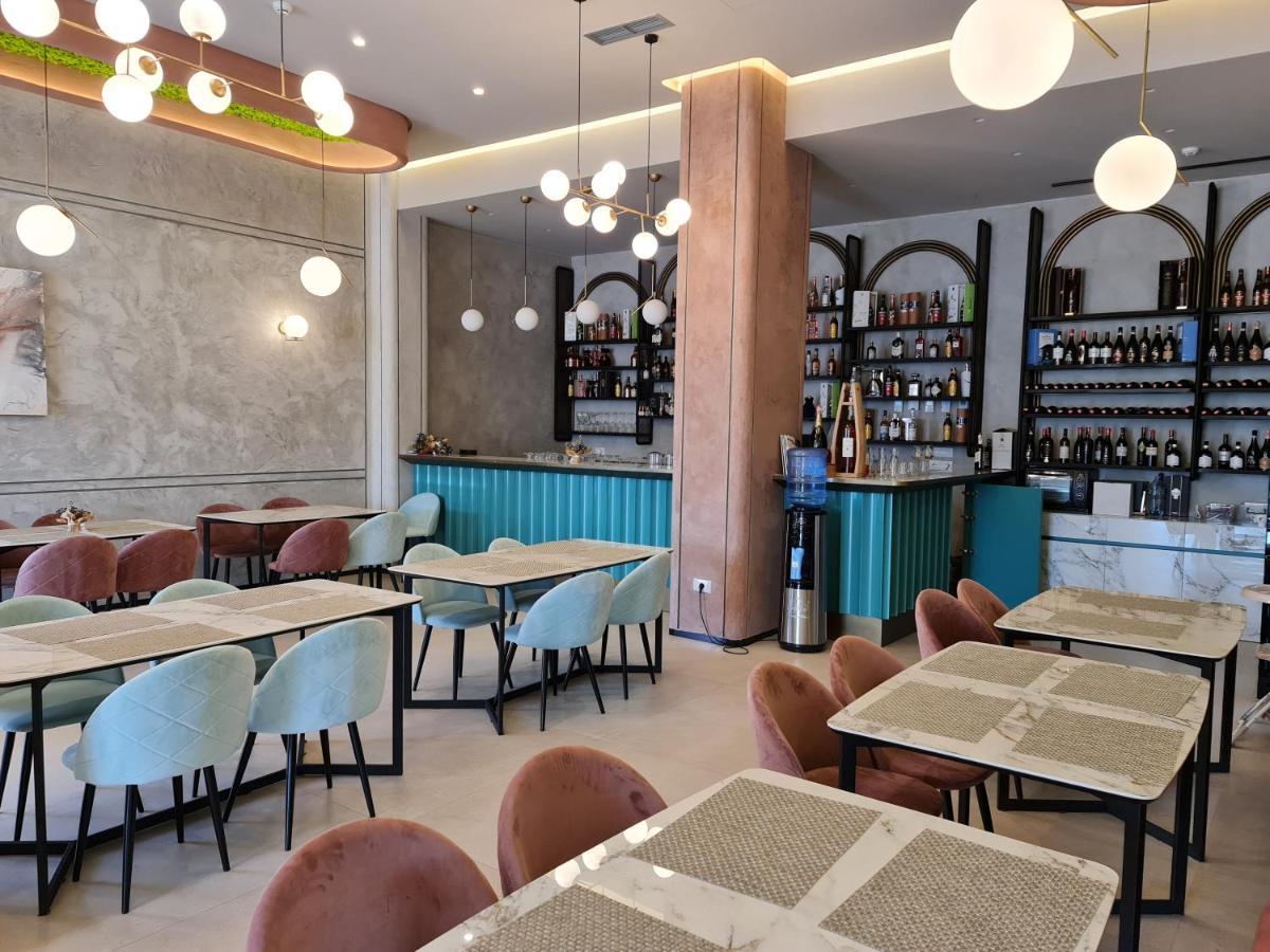 Hotel Aross Kanine Bagian luar foto